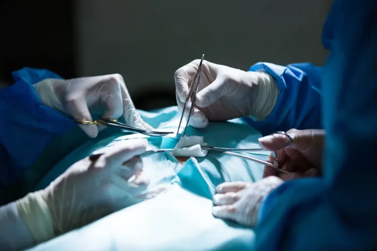 surgeons performing surgery in operation theatre